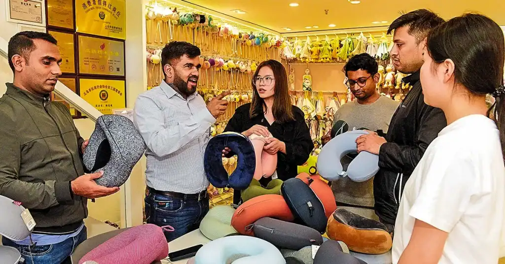 Buyer inspecting product quality dispute with Yiwu supplier in July 2026