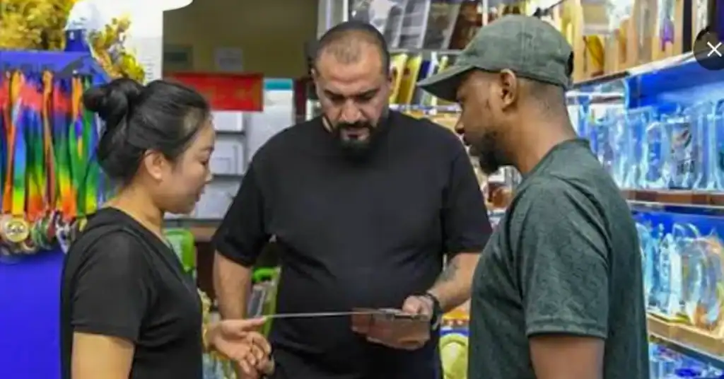 Buyer inspecting wrong products delivered by Yiwu supplier in July 2026